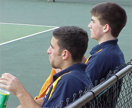 Doubles pair Andrew Jacobi '01 and Stefan Patrikis '02 during a changeover.
