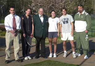 Tod Hunt visits with players and coaches at the Hunt Tennis Center.